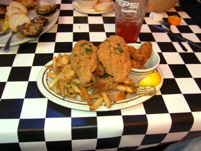 A heap o\' fried seafood at world-famous Acme Oyster House in New Orleans. 