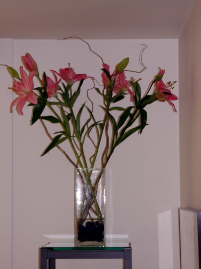 Braiden\'s simple flower arrangement of Stargazer Lilies from the Pike Place Market. 