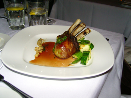A perfectly frenched rack of lamb chops graces the plate at Portage on upper Queen Anne near downtown Seattle. 