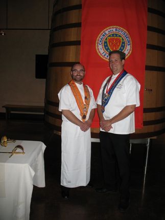 Chef Michael Allemeier accepting an award from Les Chaines des Rotisseurs. 