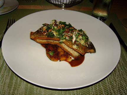 Idaho Trout at Springhill is paired with Pan-Fried Pumpkin Cakes and a Hazelnut-Parsley Salad. 