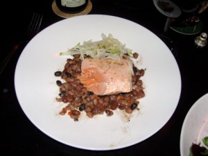 Queen City Grill\'s Olive-Oil-Poached Alaskan King Salmon was done medium-rare in the middle and tender on the outside. 