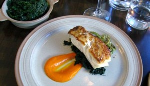 Urbane\'s Seared Halibut was served with nettles and carrot emulsion. 